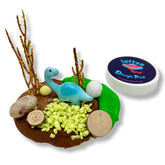 Dinosaur Toy Dough Jar, a creative play set for kids featuring vibrant dough and dinosaur-themed accessories, designed to inspire imaginative play and enhance sensory exploration.Dinosaur toy birthday return gifts